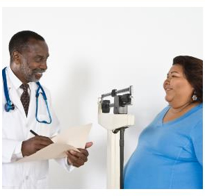 A doctor and patient with a bariatric scale