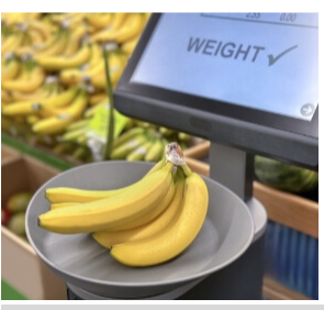 Retail scale weighing bananas